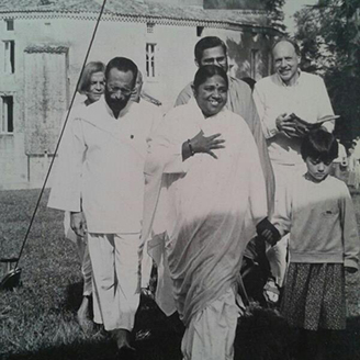 Amma walking with devotees