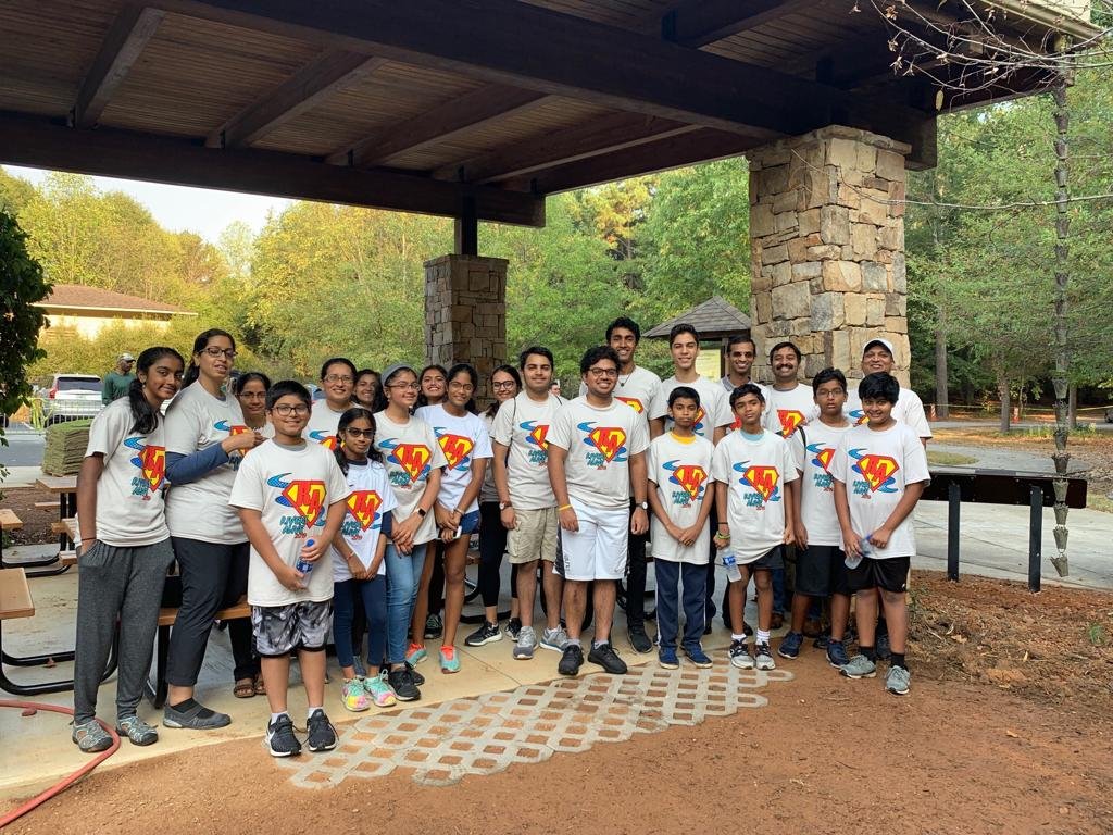 ABK and AYUDH children at a park clean-up