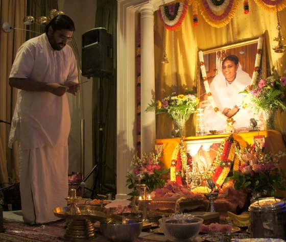 A devotee performing abhishekam on Mahashivaratri