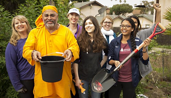 AYUDH youth with Swami at a service project