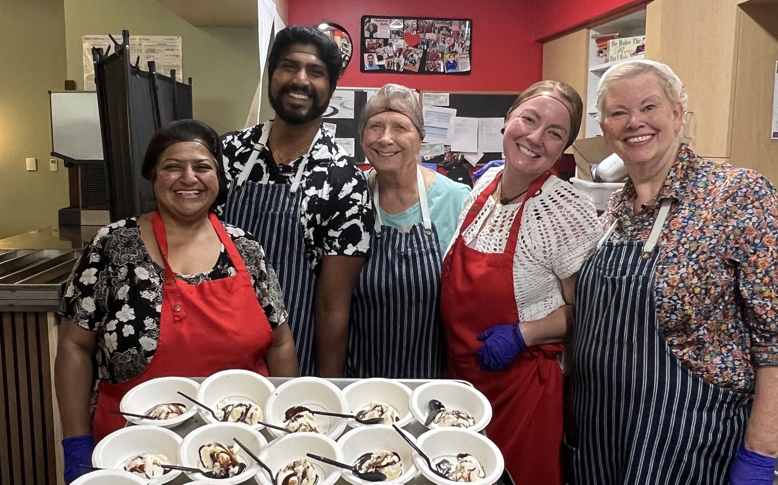 Mother's Kitchen volunteers with meals for the Downtown Women's Center
