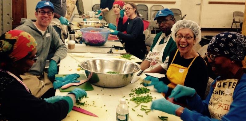 Mother's Kitchen volunteers preparing a soup-kitchen meal