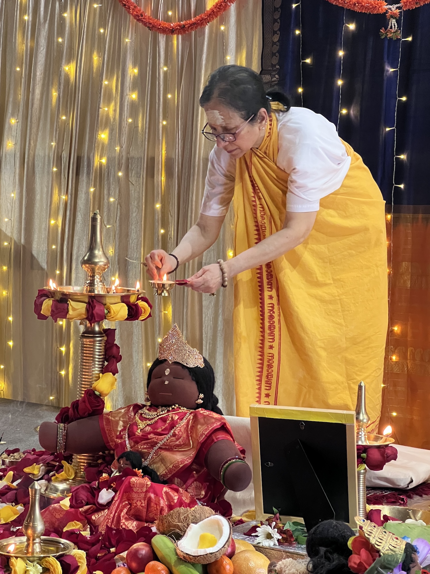 Sarva Amriteshwari Puja altar and lamps