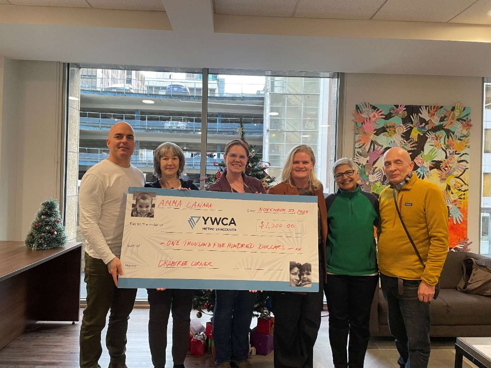 Presenting the Presents of Peace cheque at the Vancouver YWCA