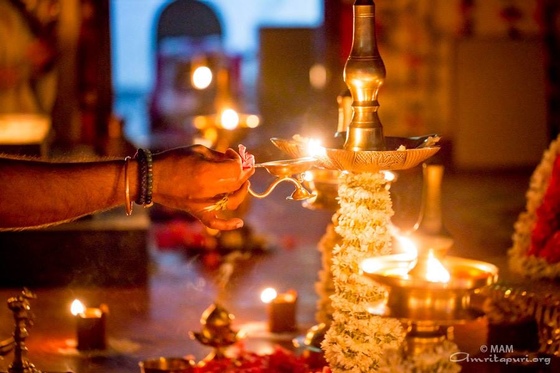 Flower offering at the Karthika lamp
