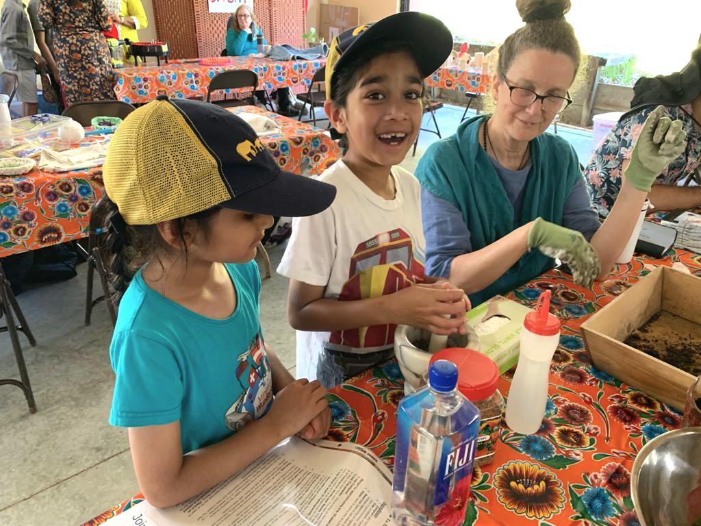 Children making seed balls at MA Center San Ramon