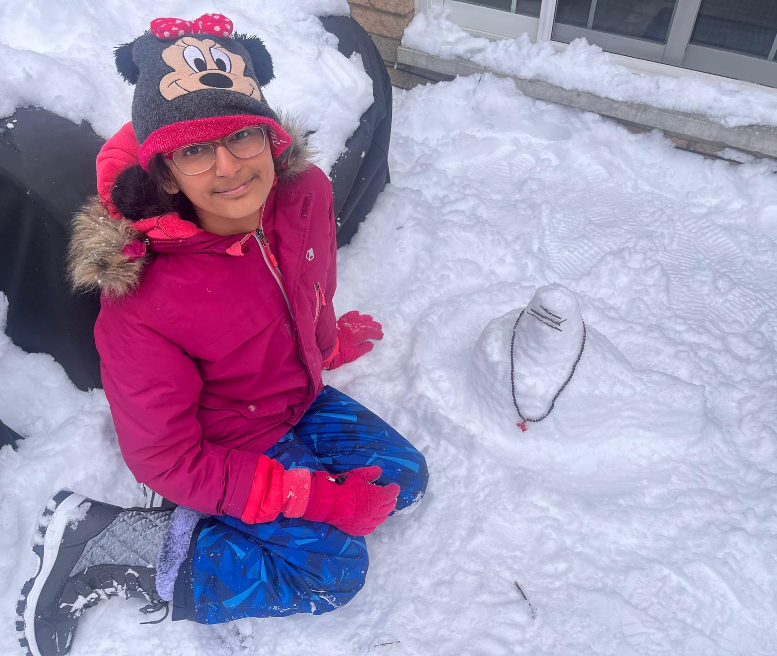 Amrita Bala Kendra Students Make Siva Lingams of Snow