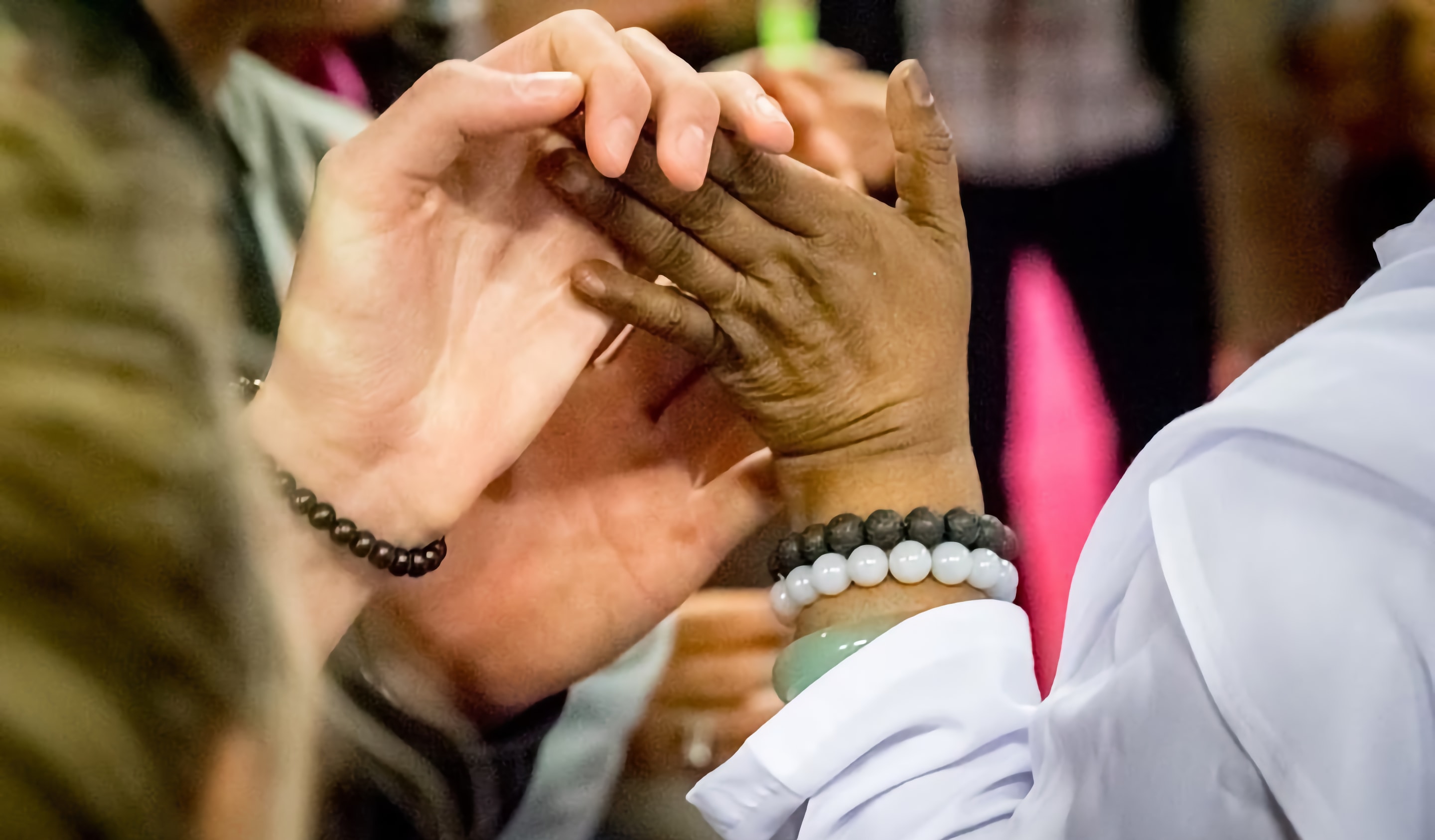 Amma hands touching 