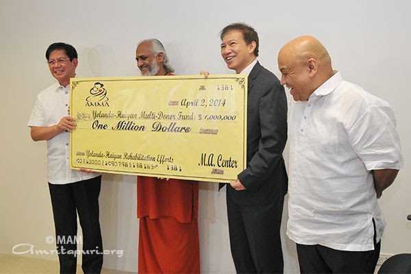 Amma Dedicates $1 Million in Aid to Philippines