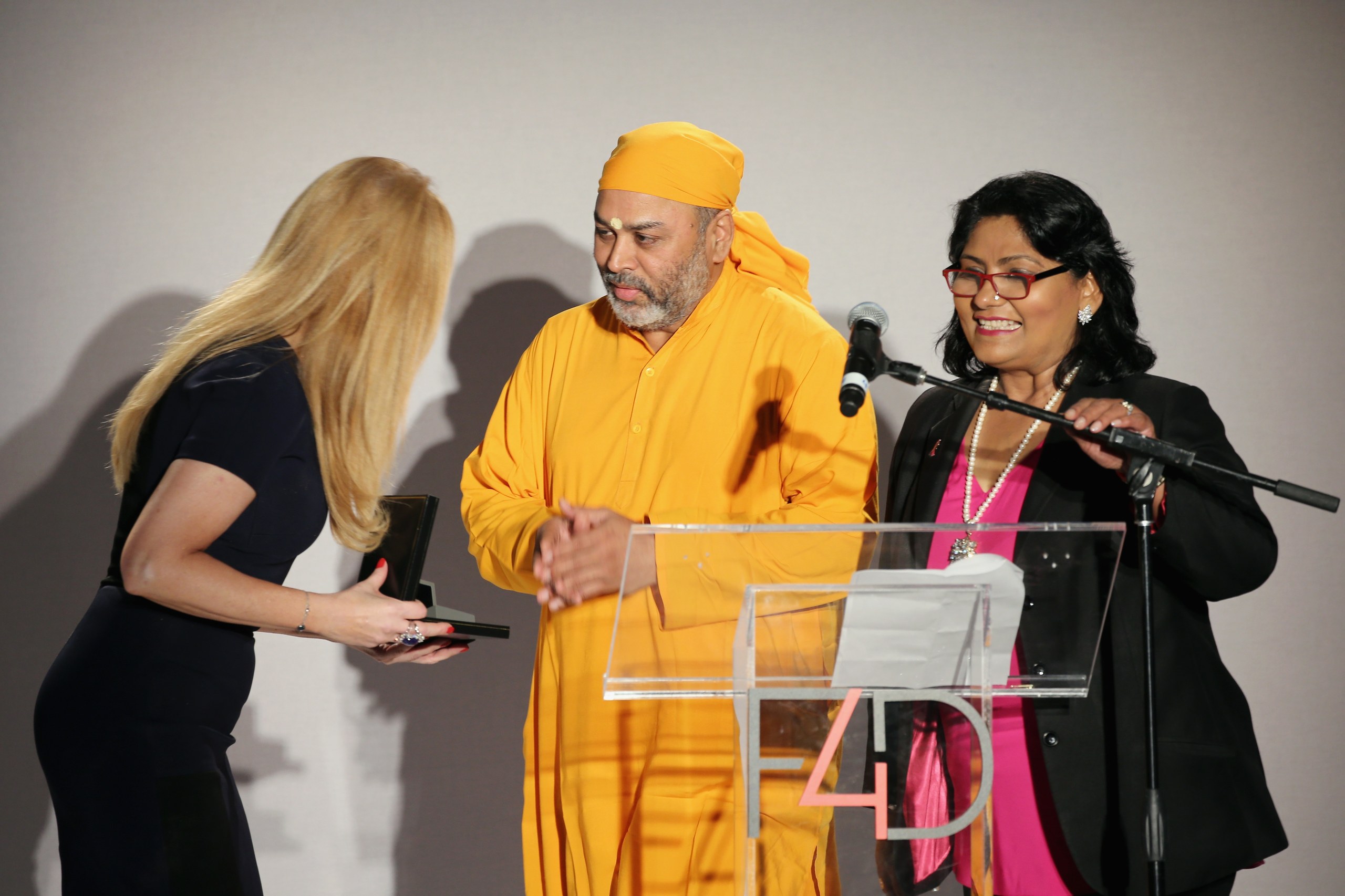 Amma receives Medal of Honor from Fashion 4 Development