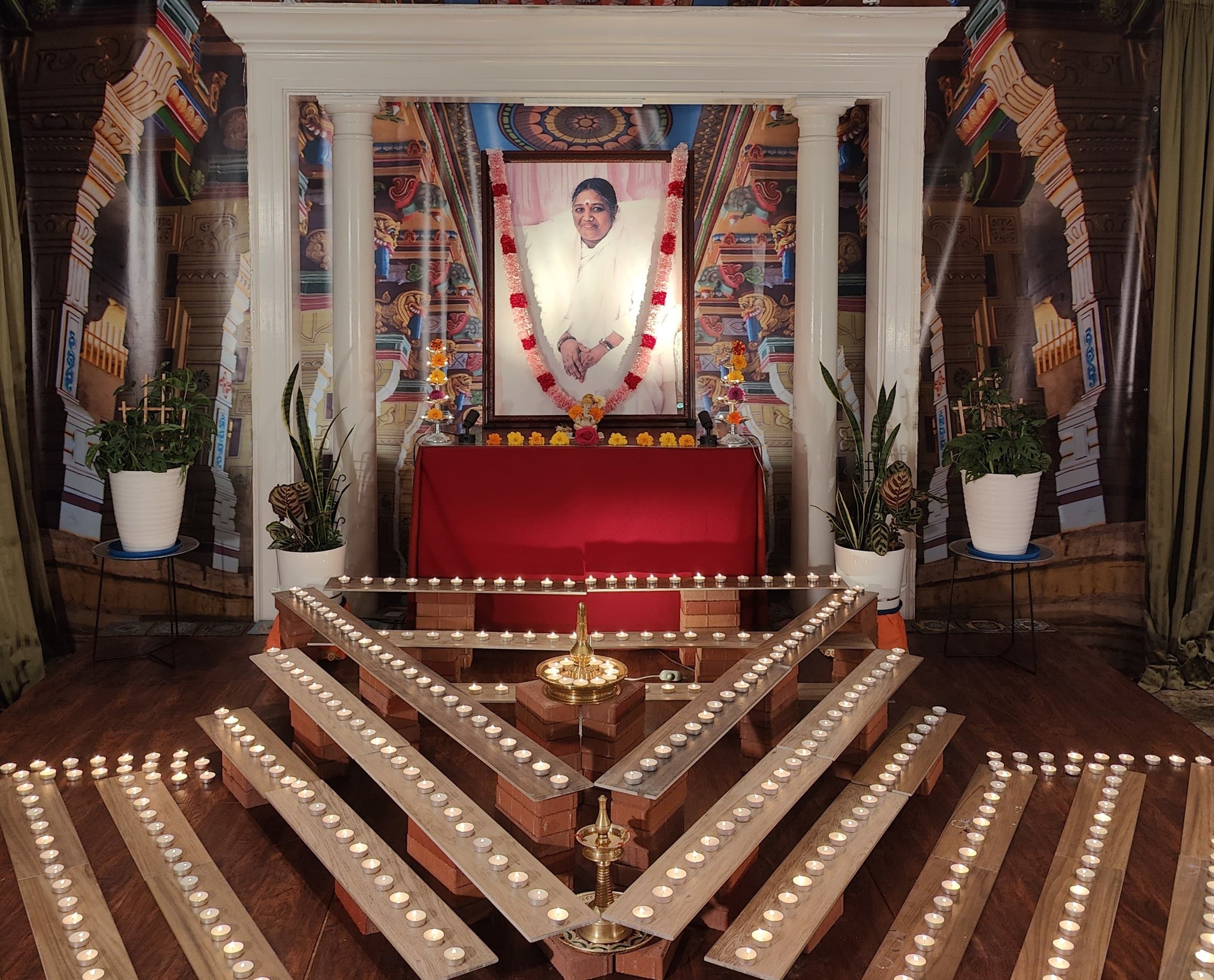 The altar at MA Center Washington DC, lit with rows of lamps
