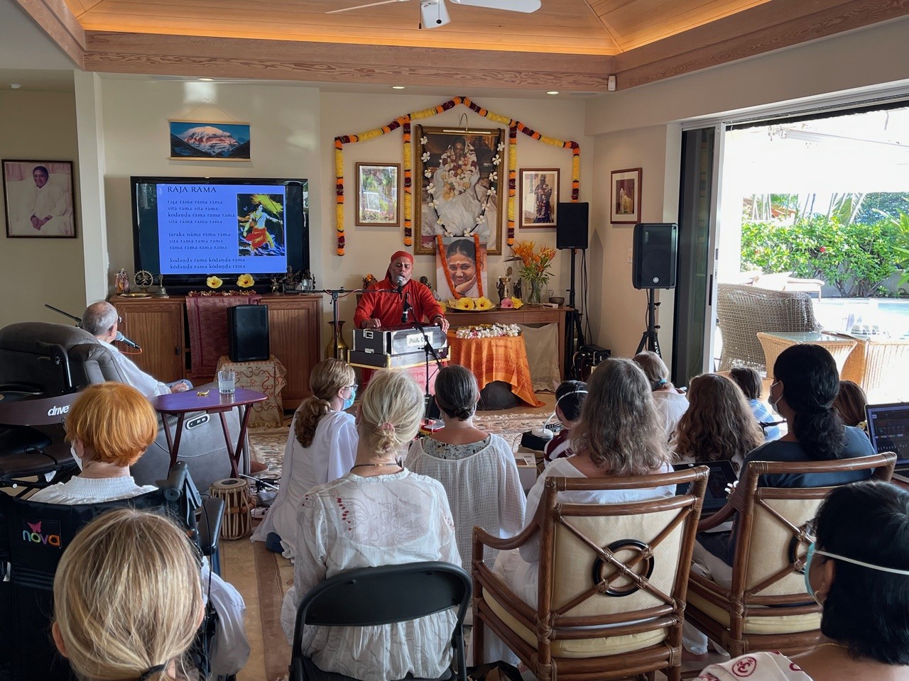A satsang gathering in Maui, with Amma's altar and bhajans at the front