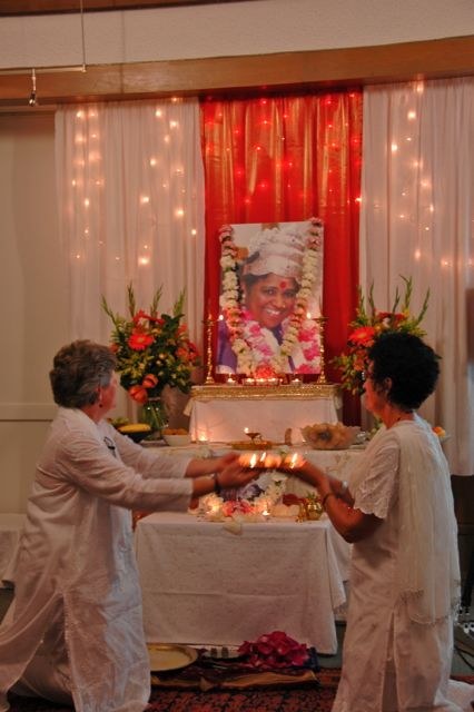 Offering arati at Amma's 59th birthday celebration in Vancouver