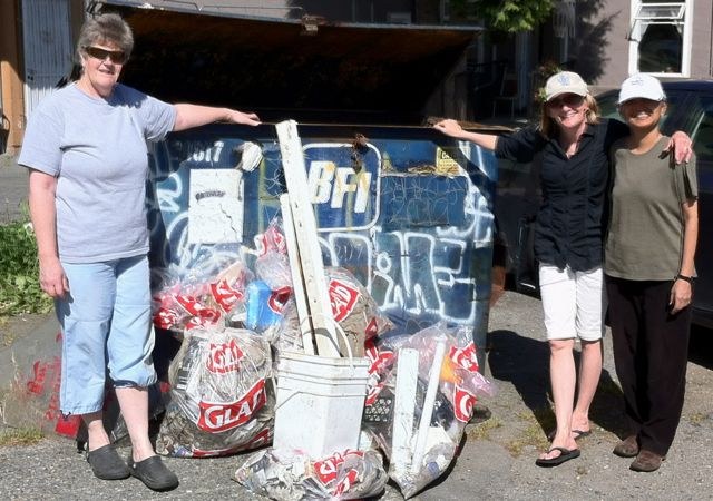 Volunteers with bags of litter collected for Keep Vancouver Spectacular