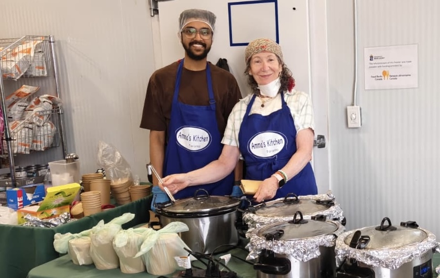 Youth volunteers serving vegetarian chilli at Georgetown Bread Basket