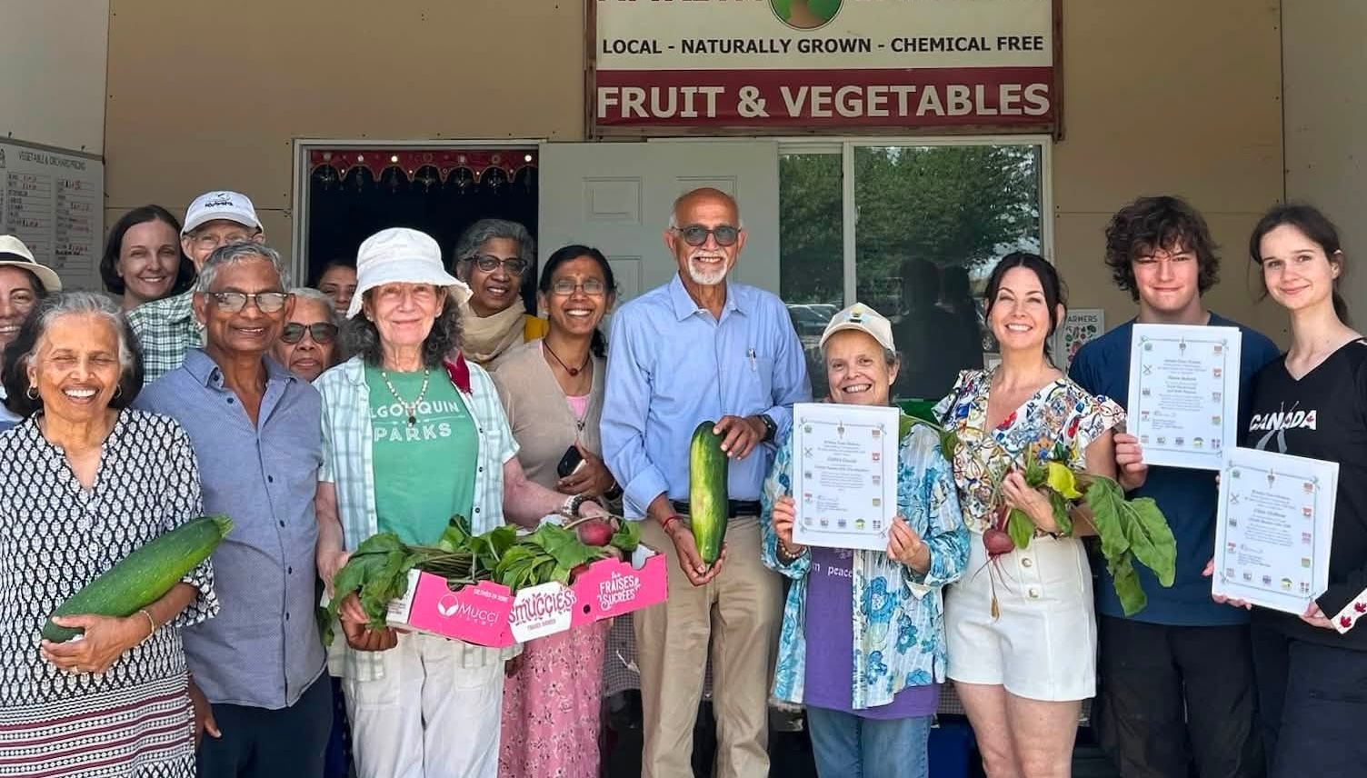 MP Kristina Tesser Dirksen with Amma Canada volunteers at the farm
