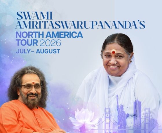 Swami Amritaswarupananda smiling