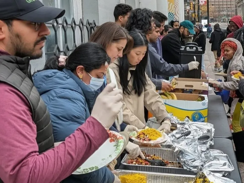 Mother's Kitchen volunteers serving a meal