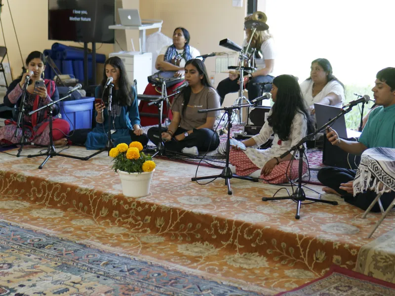 Youth singing kirtan at MA Center