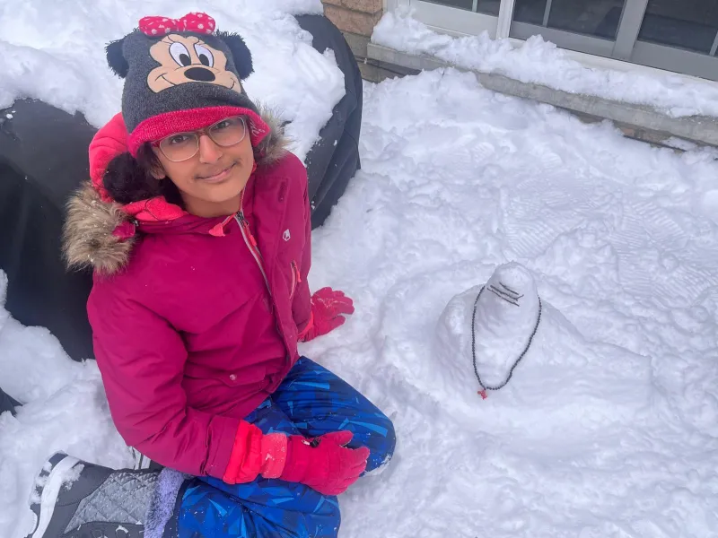 Amrita Bala Kendra Students Make Siva Lingams of Snow