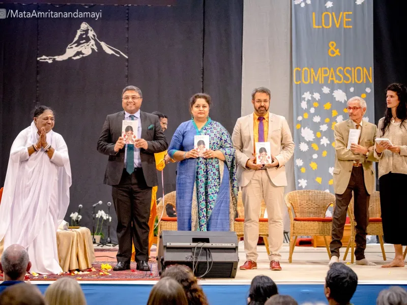 Amma's 32nd visit to the land of the alps