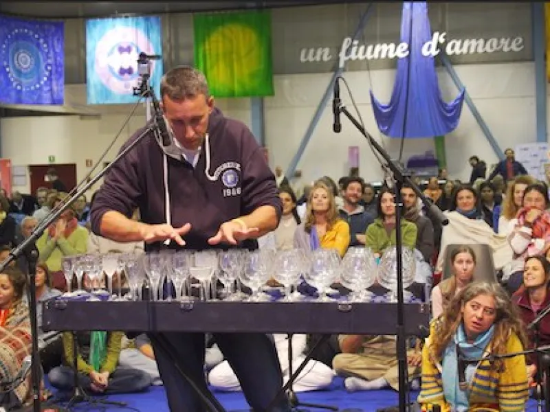 The language of love is a silent embrace - Italy welcomes Amma