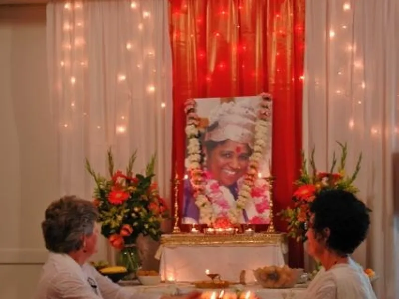 Offering arati at Amma's 59th birthday celebration in Vancouver