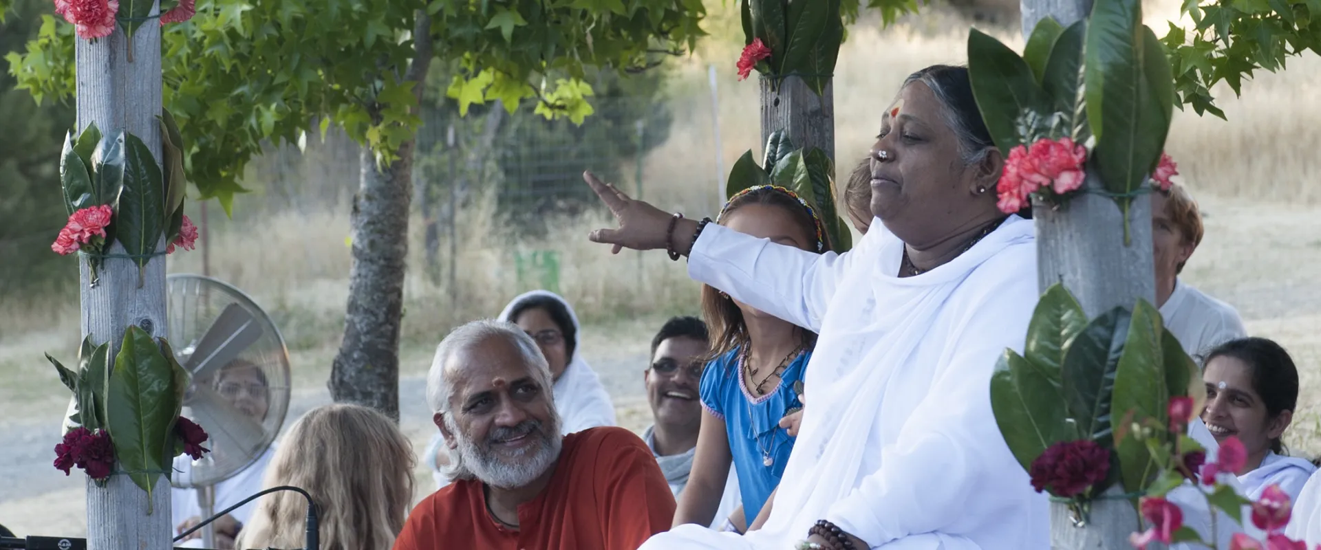 Amma with devotees at a retreat