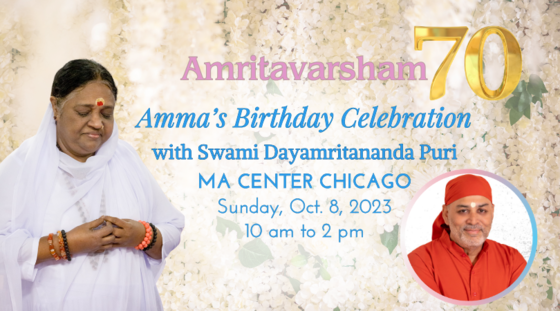 Amma standing with folded hands on a background of white flowers with a thumbnail photo of Swami Dayamritananda