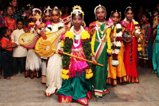 Little girls dressed as Divine Mother