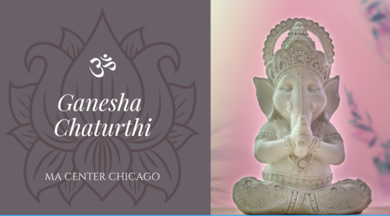 A stone Ganesha statue with hands folded in prayer