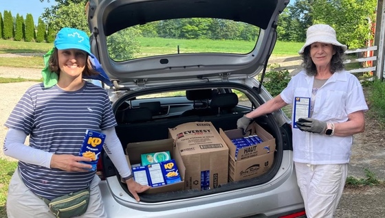 Ayana & Mahita with donated Kraft Dinner