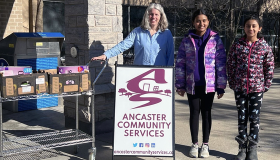 Young Amma Canada volunteers delivering food donations to Ancaster Food Bank