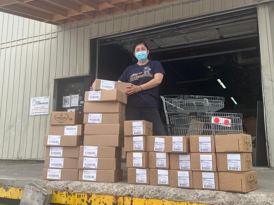 Feed Scarborough staff receiving food donations