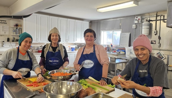 Volunteers chopping veggies