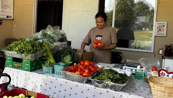 Than Aunty at Veggie Sales Table Aug 2025