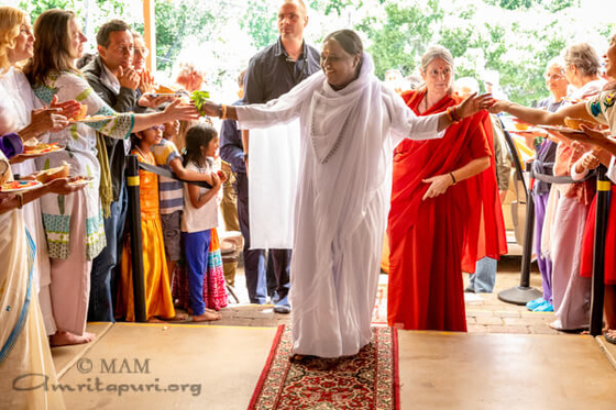 Amma entering the hall in San Ramon M.A.Center, California