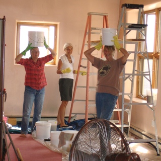 volunteers with buckets