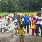 Boy playing uriyadi (smash the pot)