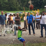 Boy playing uriyadi (smash the pot)