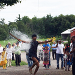 Young man playing uriyadi (smash the pot)
