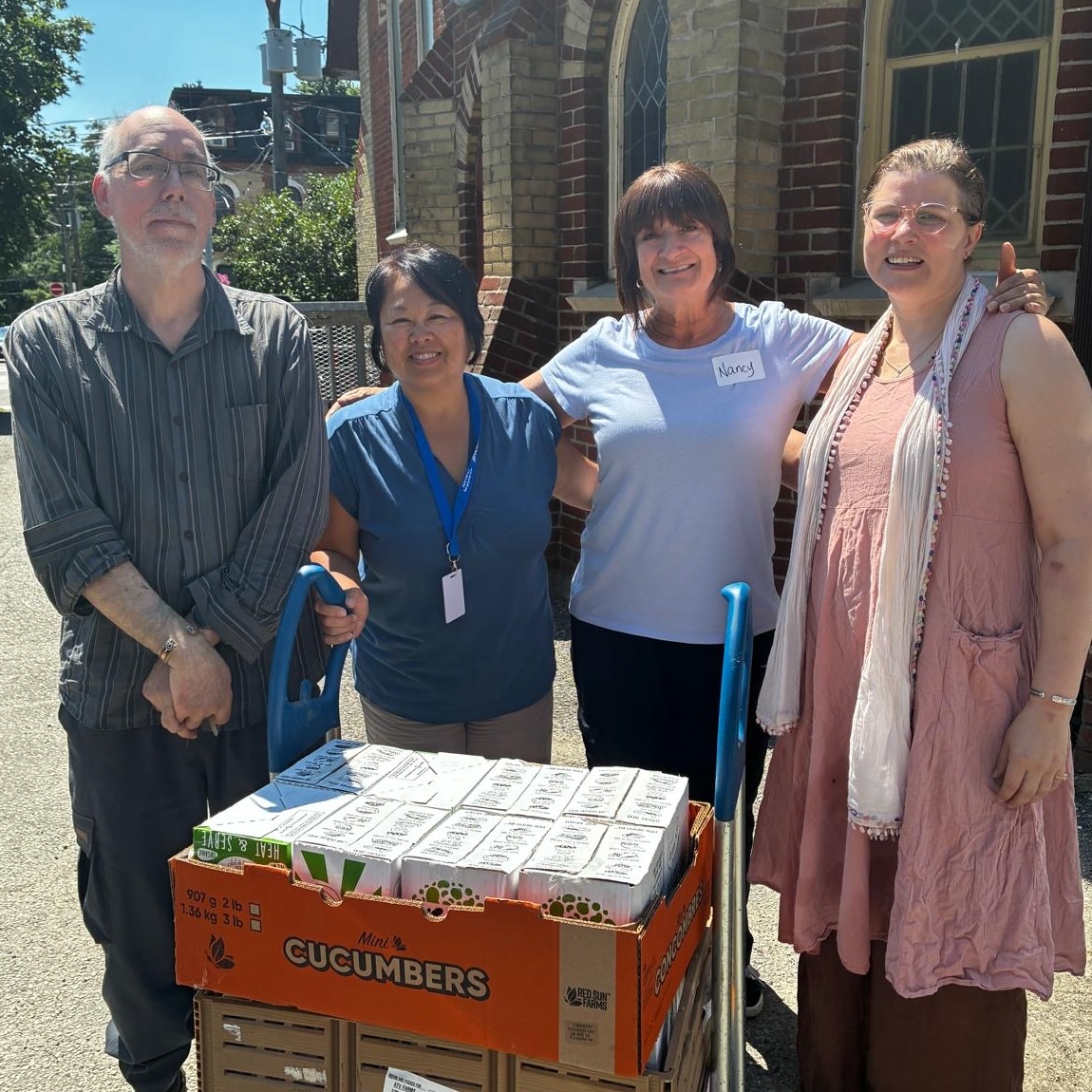 Amma Canada volunteers delivering chilli