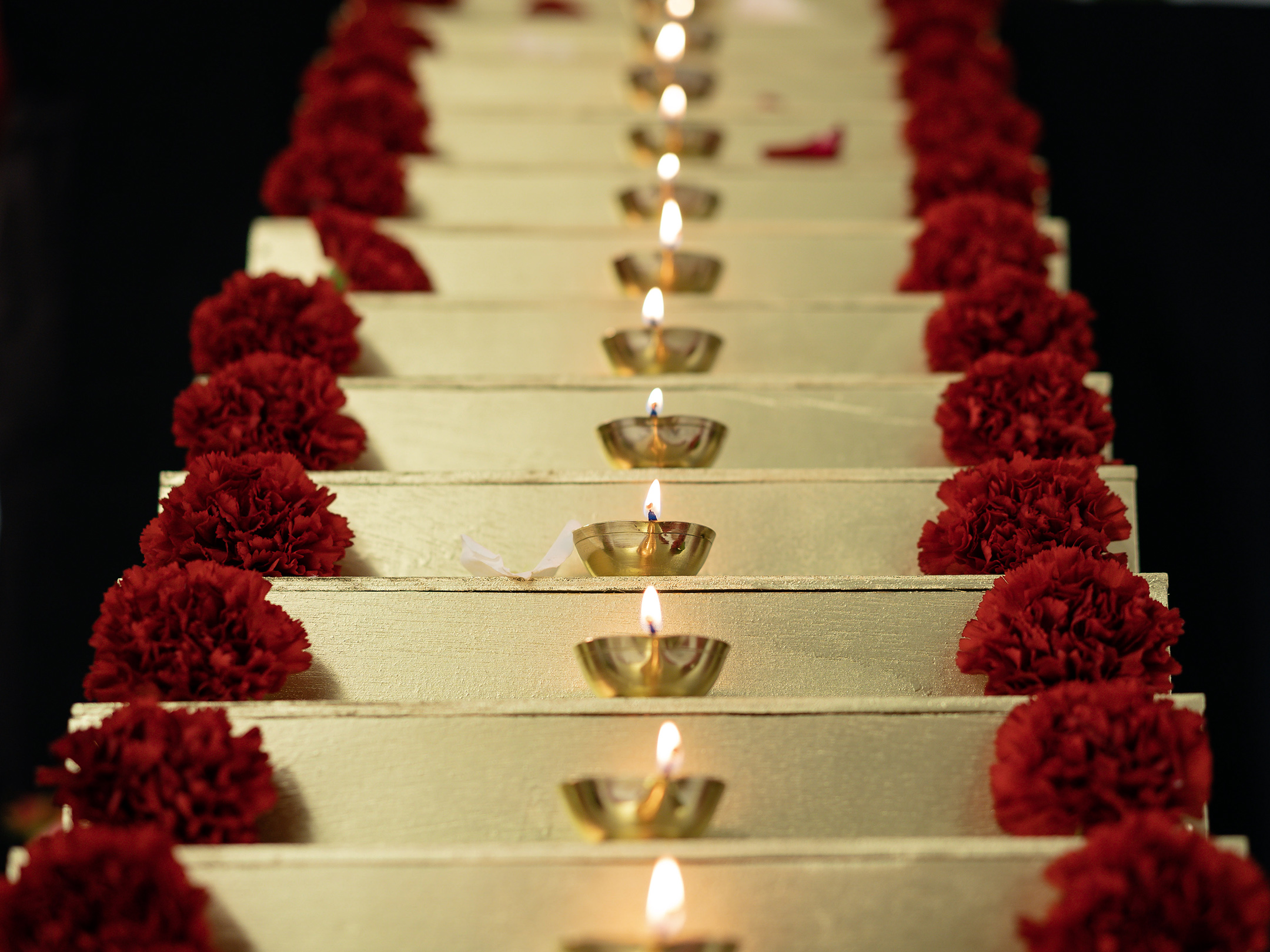 Row of lamps on golden steps