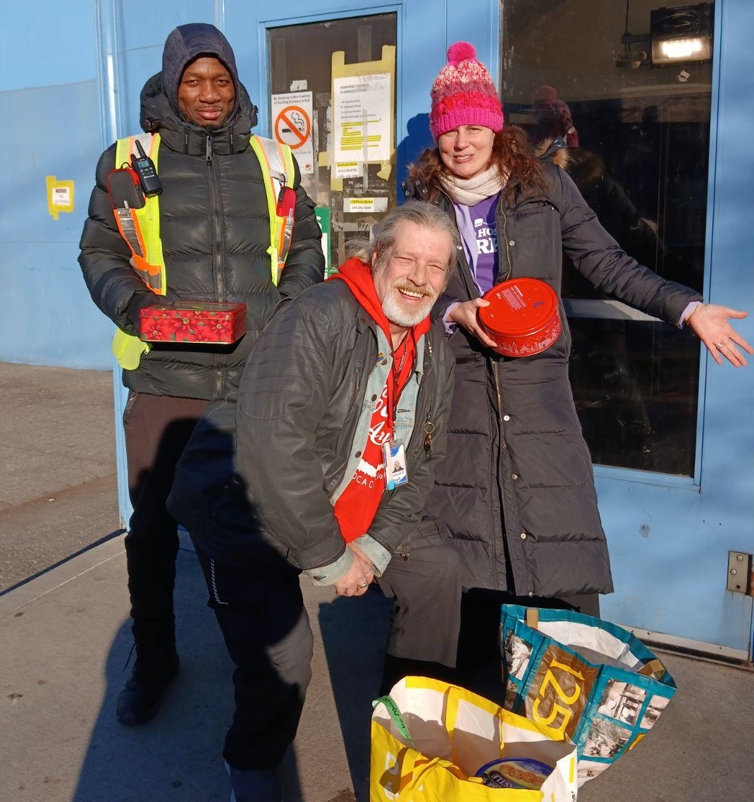 Amma Canada volunteer delivering Christmas Cookies to St Felix Centre