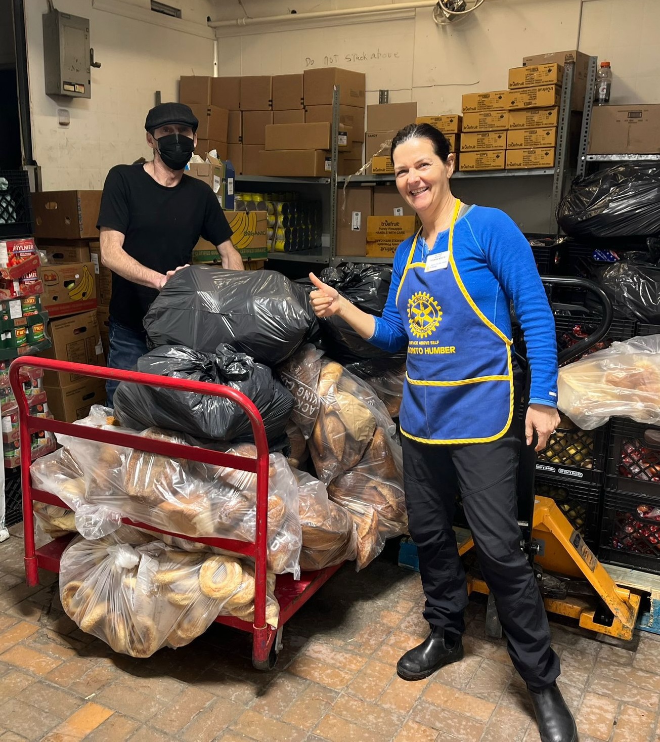 Food bank staff receiving donations