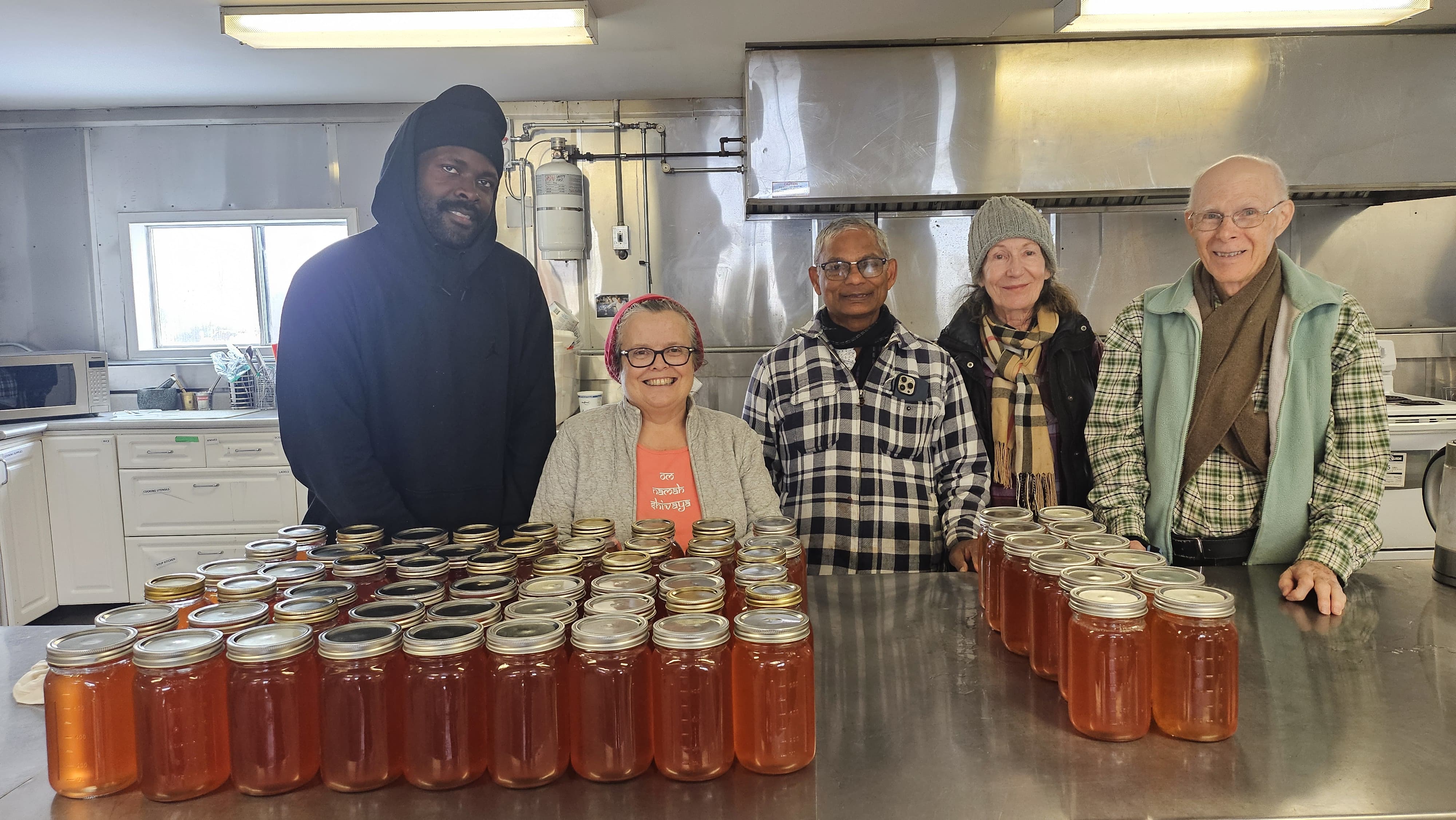 Farm Team with freshly pressed and bottle apple juice
