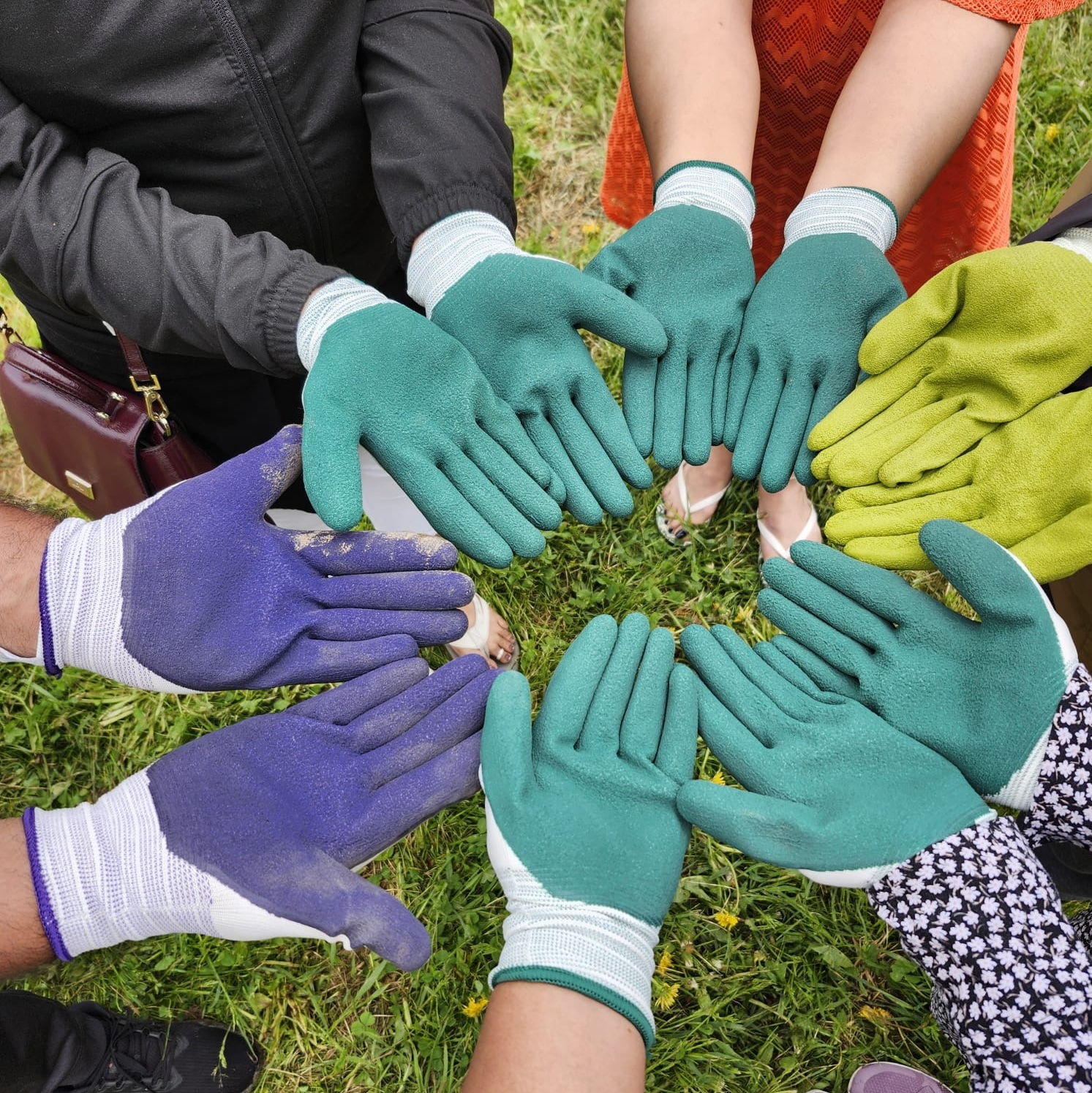 Mothers' Hands in garden gloves