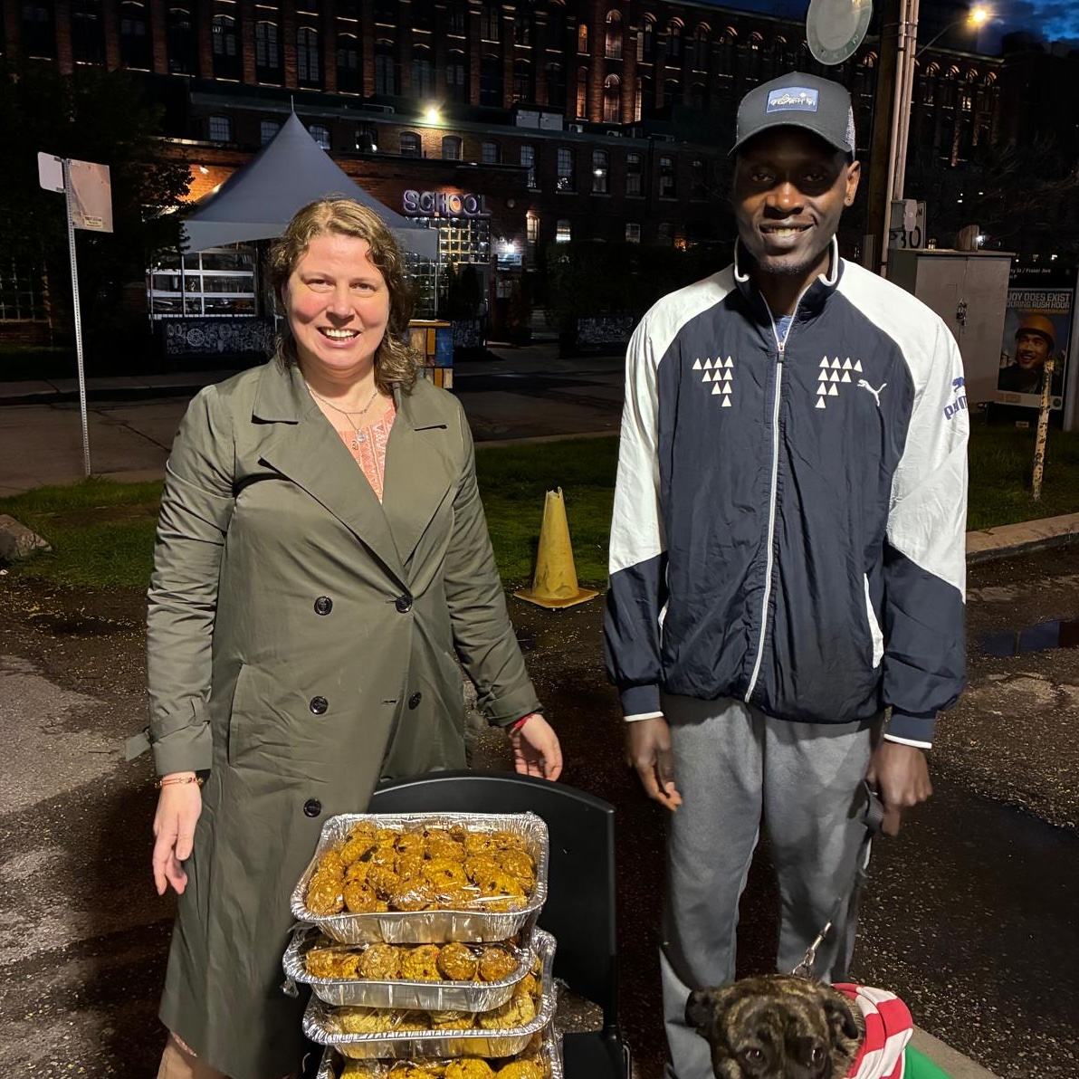 Amma Canada volunteer delivering cookies to St Felix Staff
