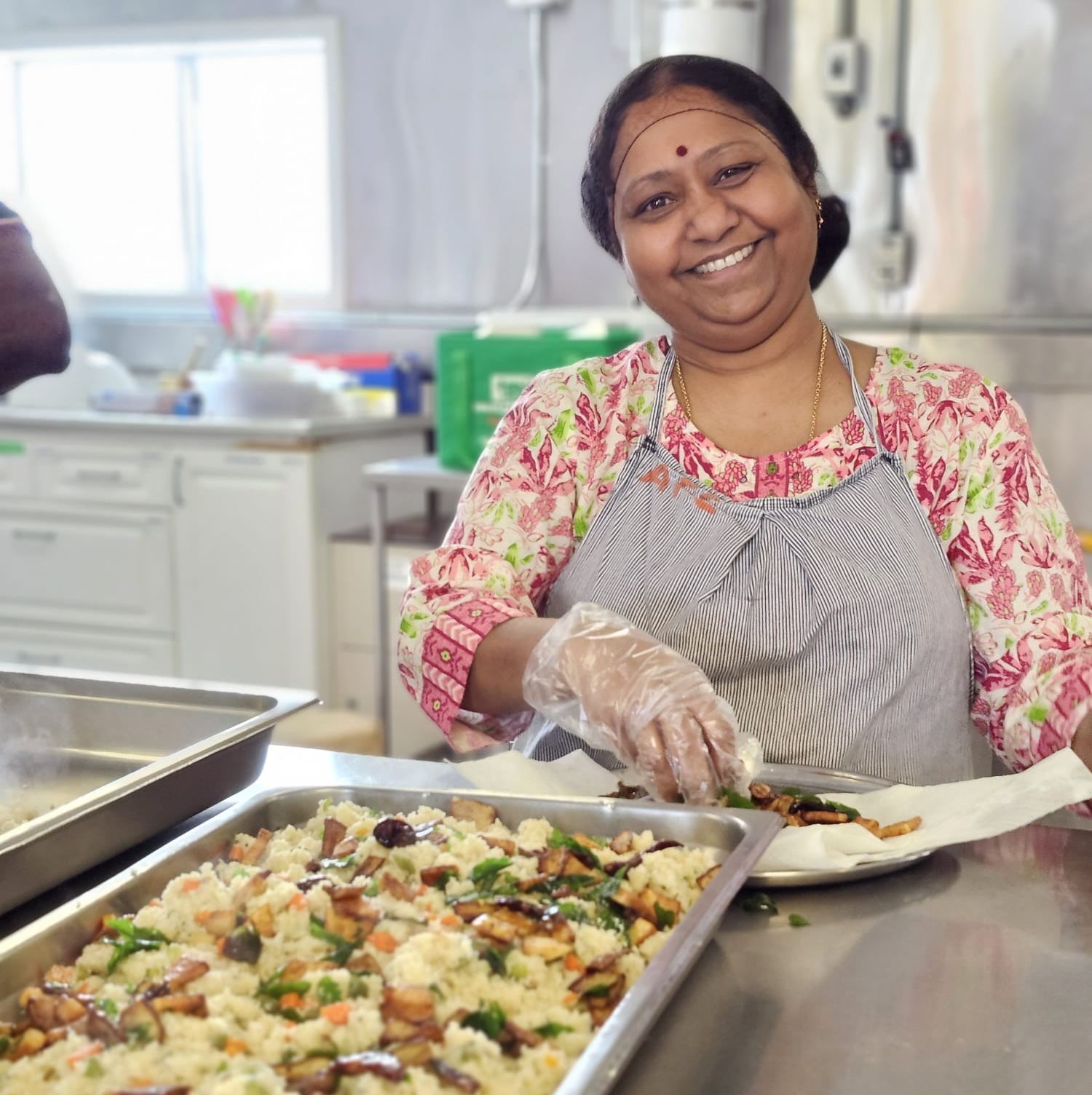 Sindhu Aunty serving food